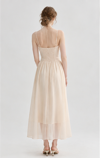 Light peach-colored spaghetti strap lace-trimmed long dress