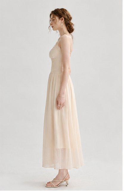 Light peach-colored spaghetti strap lace-trimmed long dress