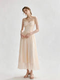 Light peach-colored spaghetti strap lace-trimmed long dress