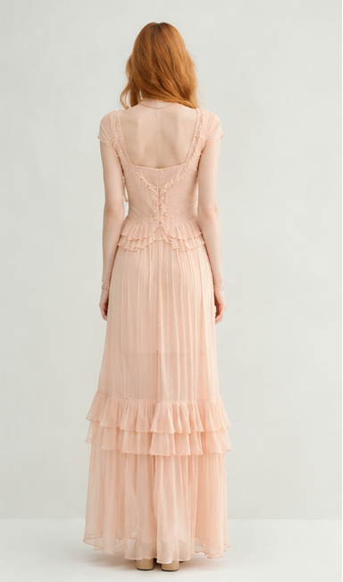 Nude-colored off-shoulder light dress